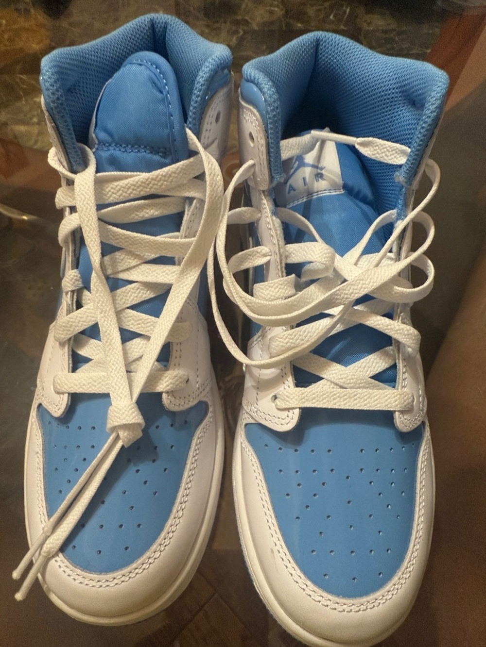 Jordan 1 Mid Legend Blue and White High Top Sneakers